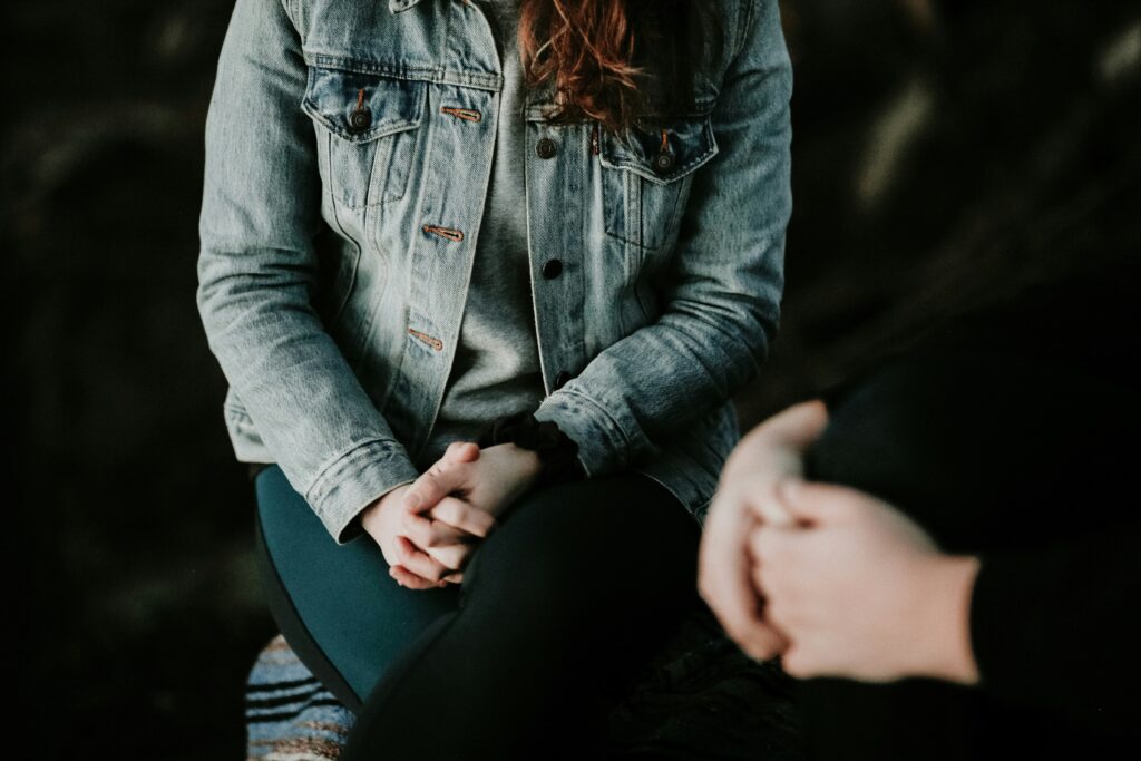 A close up of two people having a discussion. This could represent meeting with a ketamine therapist in Boulder, CO for support with treatment resistant depression. Search for ketamine assisted therapy in Boulder, CO to learn more about how a psychotherapist in Boulder CO can help.
